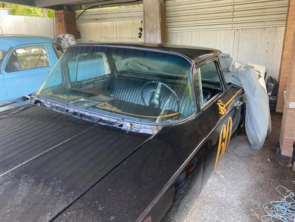 Classic car in a garage ready for windscreen replacement