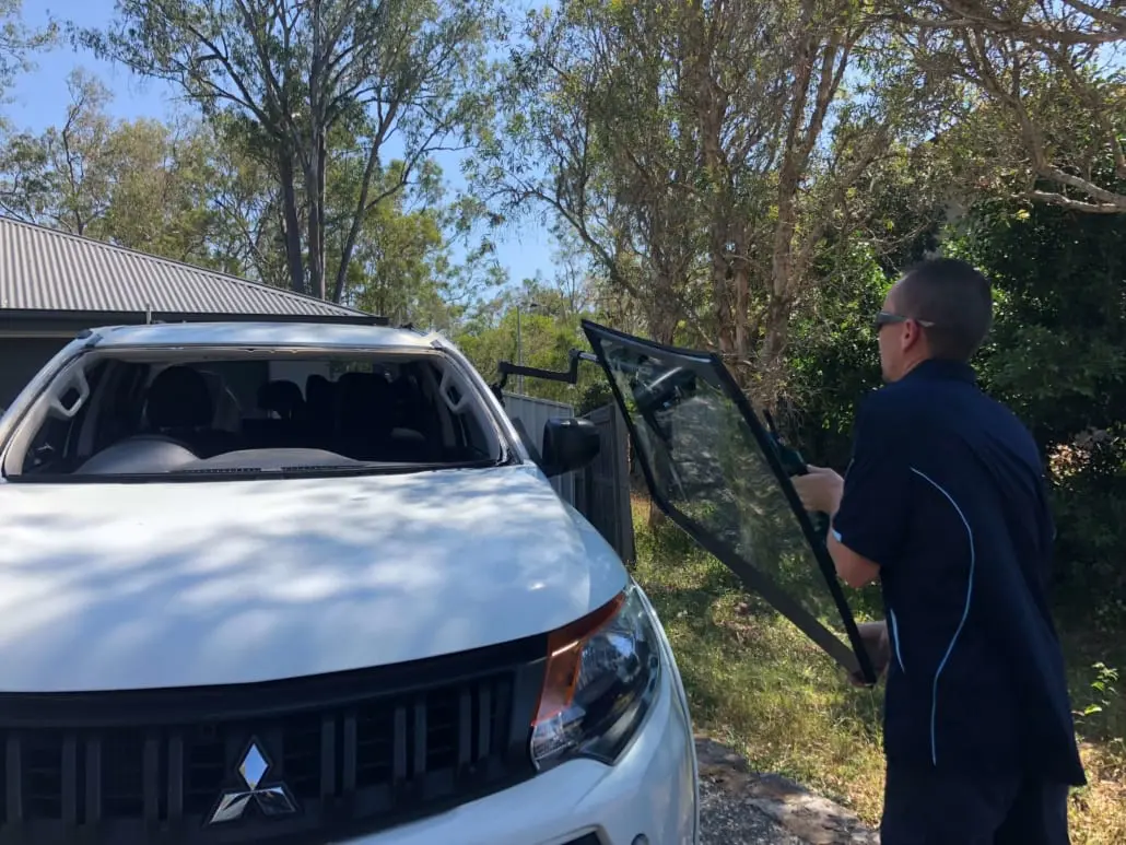 Rapid Response Autoglass service van at a customer's home
