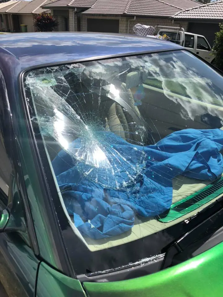 Badly cracked car windscreen awaiting replacement