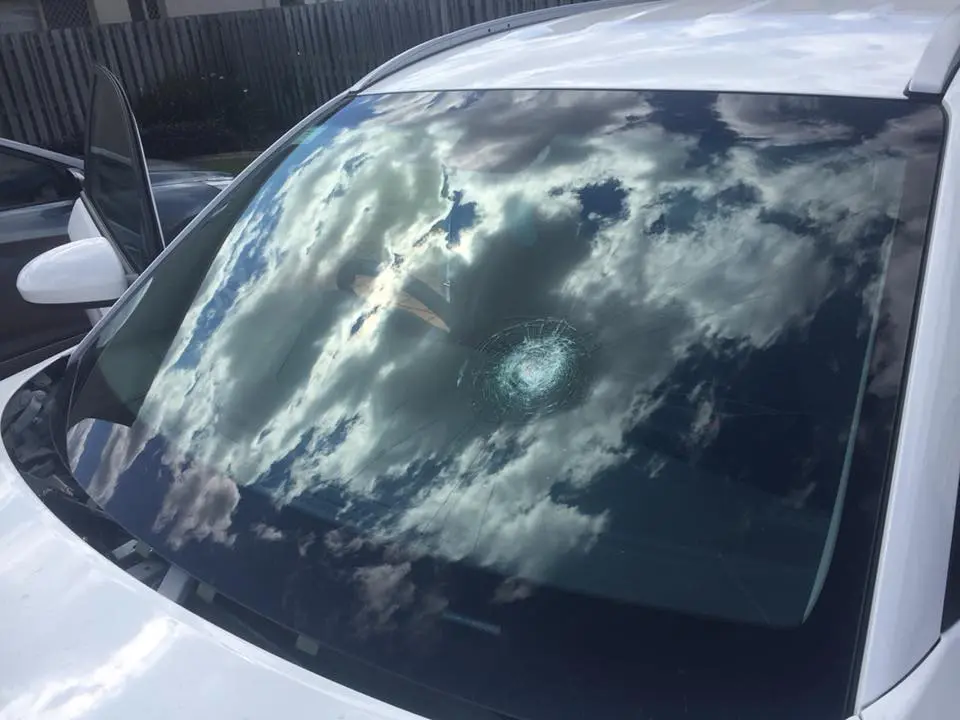 Car with a smashed side window